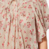Neslya kortemouwen blouse van bedrukte mousseline